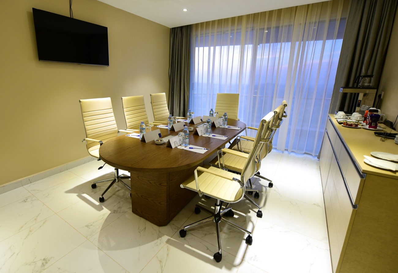 Executive boardroom set for a planning session with leather chairs