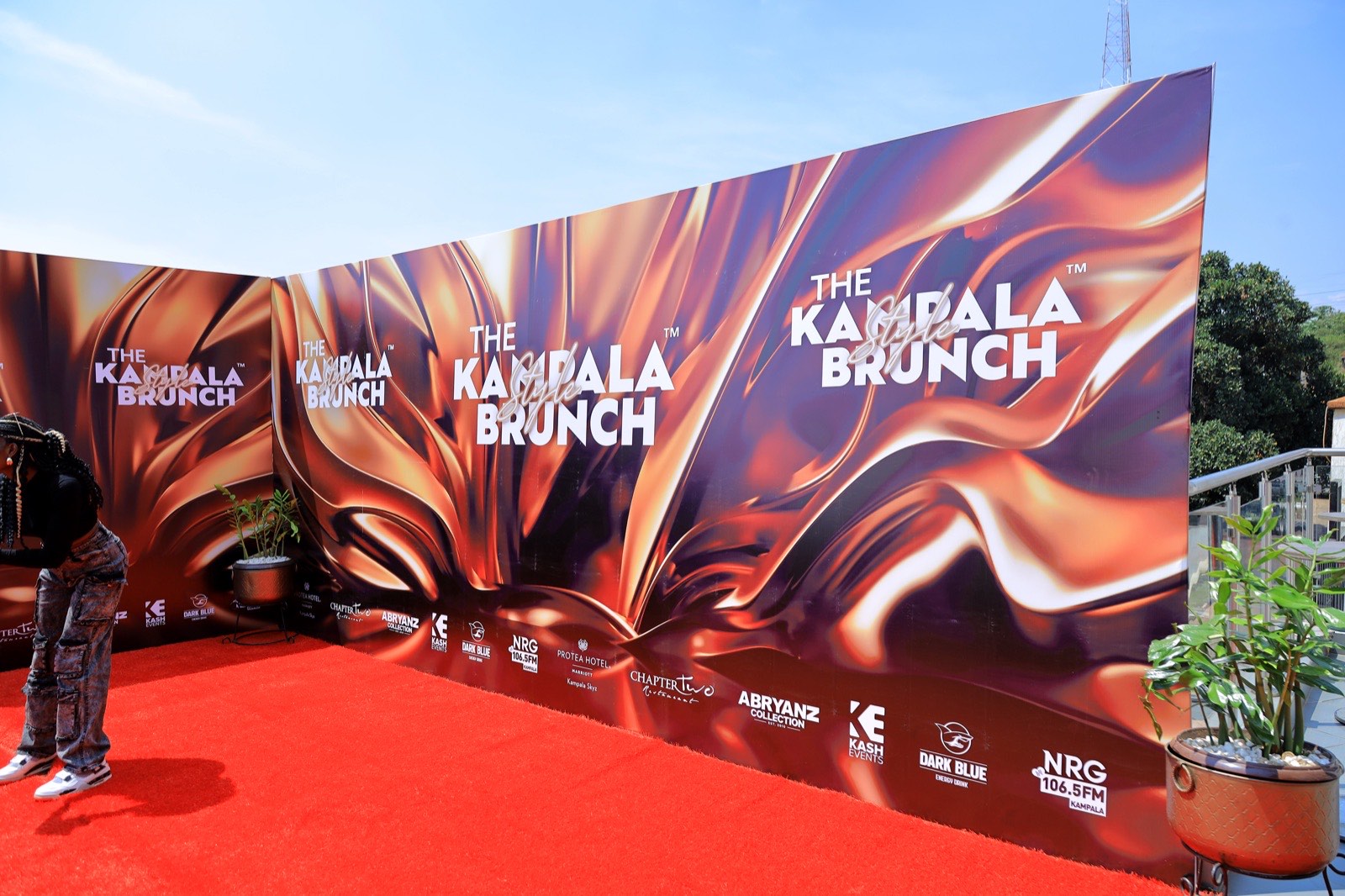 The red carpet and branded backdrop wall at The Kampala Style Brunch, June 2024