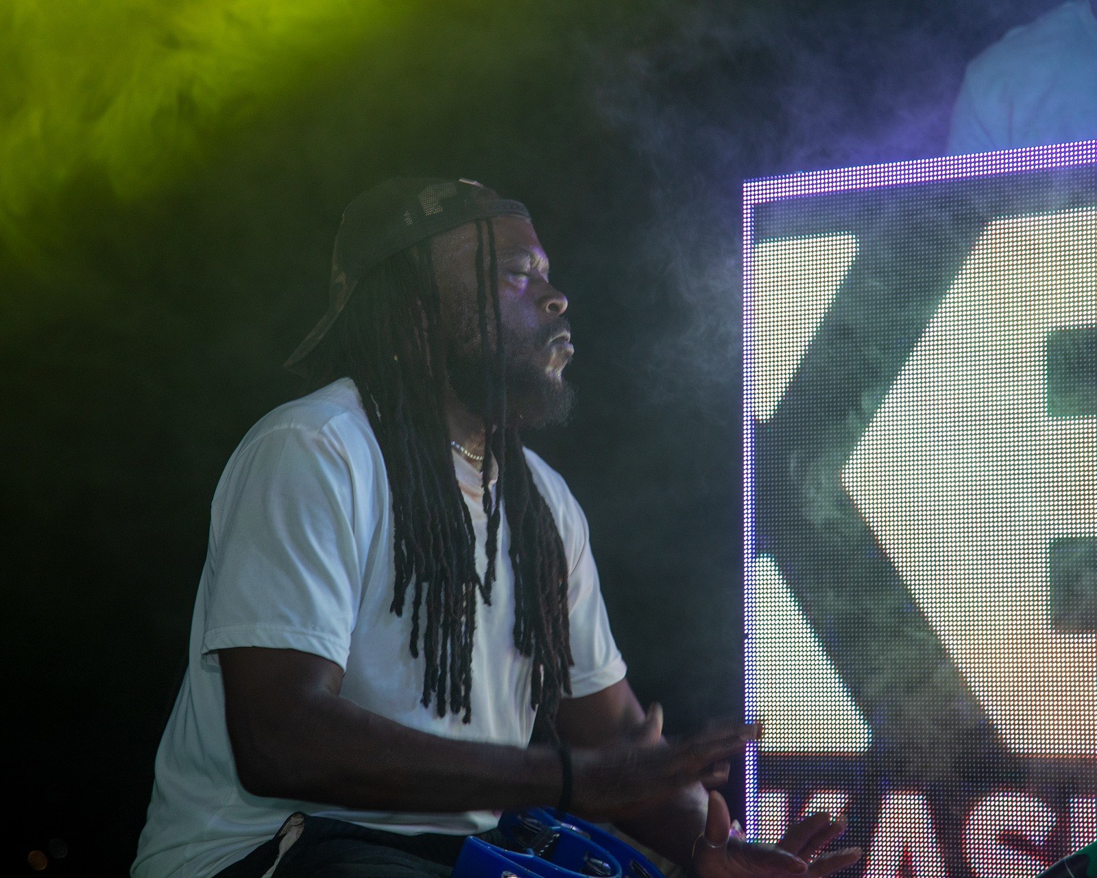 A performer on stage as The Kampala Style Brunch runs into the night, May 2024