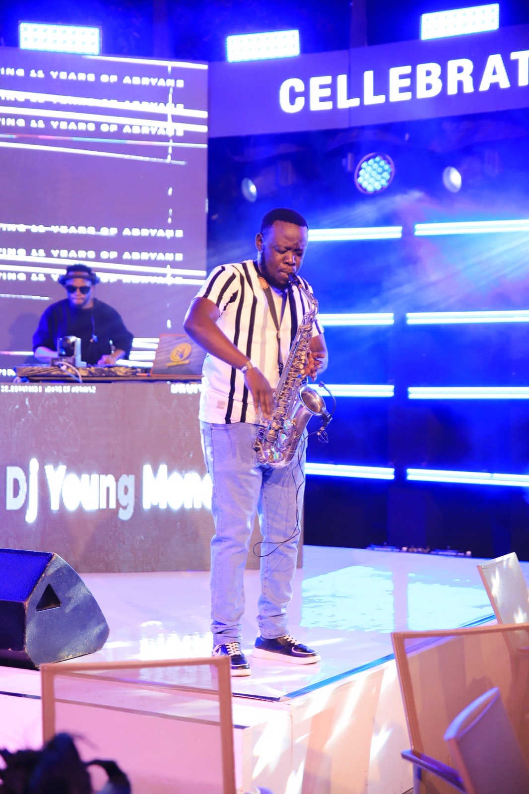 A saxophonist performs live on stage at The Kampala Style Brunch, October 2024