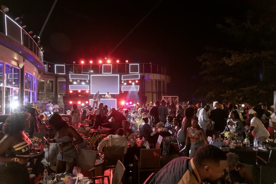 Lariza Terrace at night with ambient lighting and a live DJ, the home of Wednesday Grill Night