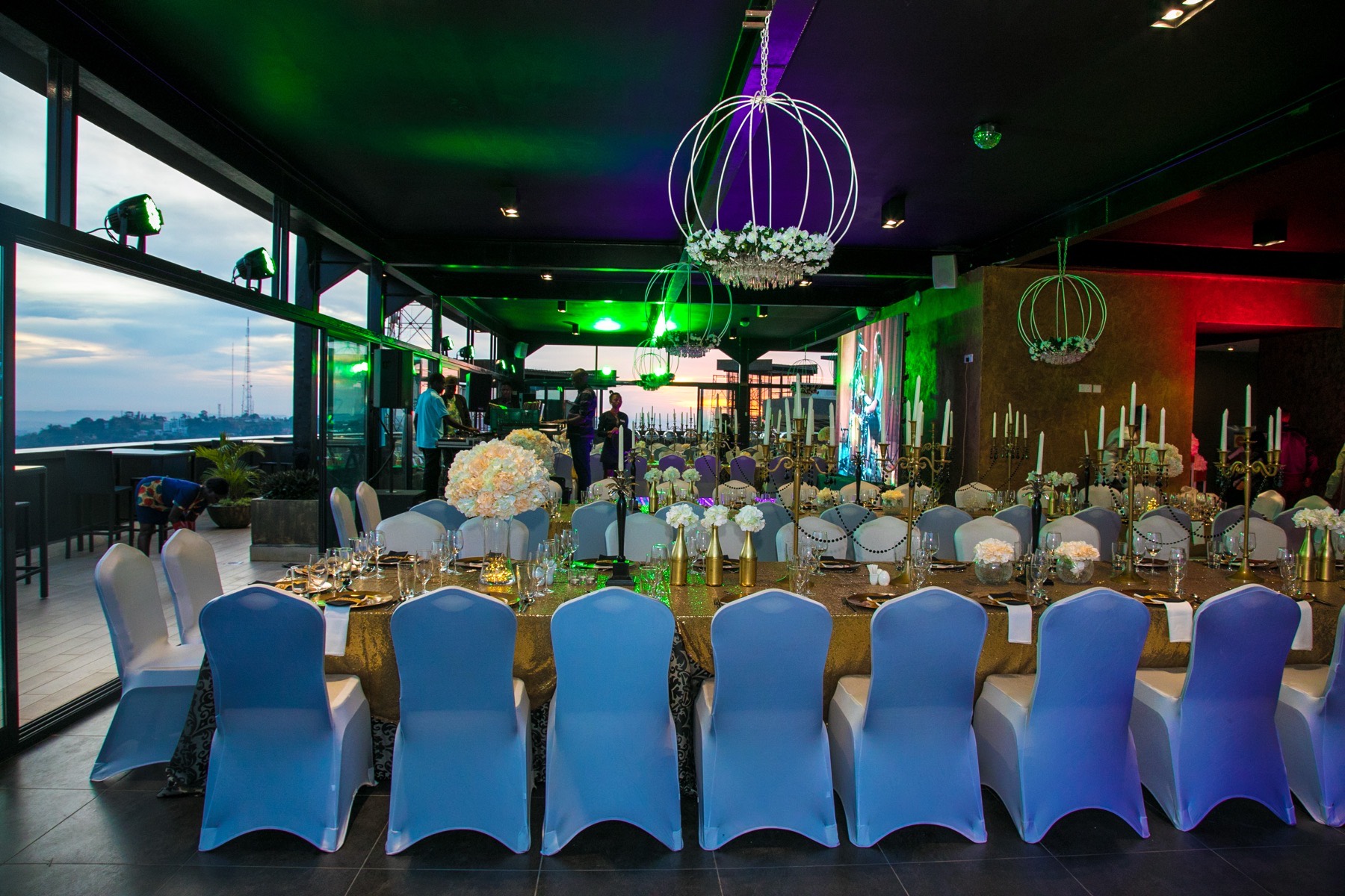Eclipse rooftop events venue glowing with warm lights in the evening