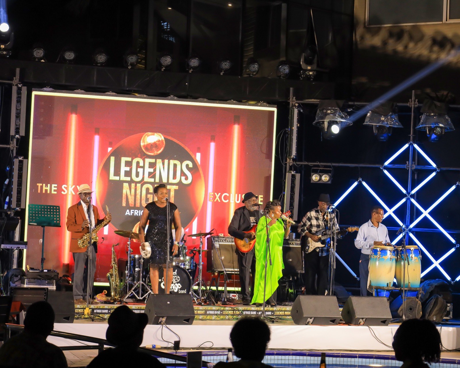Afrigo Band's vocalists performing at Legends Night, Tropicanna Poolside