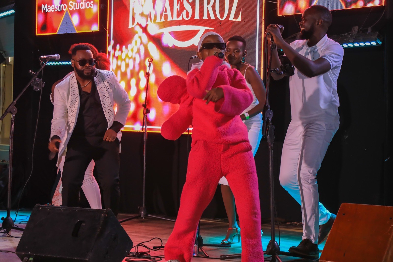 Aziz Azion performing with the live band at The Skyz Exclusive