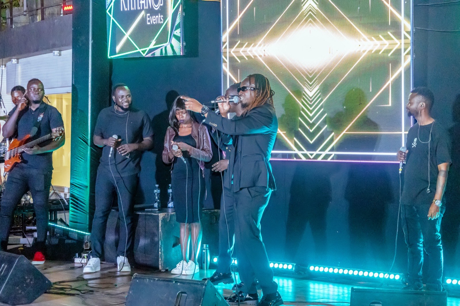 B2C singing on stage at Tropicanna Poolside