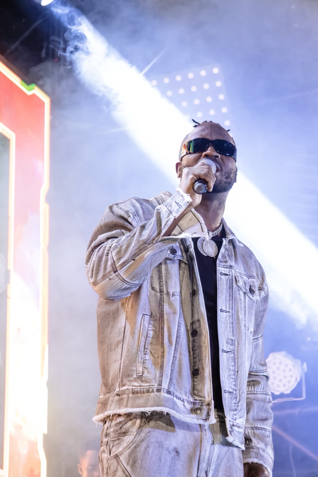 Bebe Cool singing into the microphone at The Skyz Exclusive