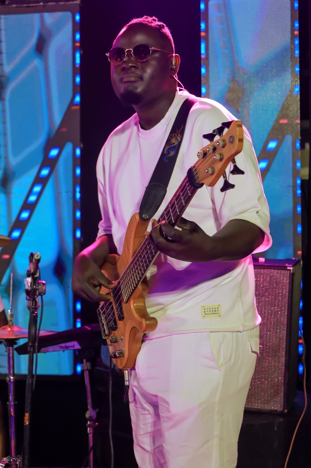 D'Maestroz Band's bassist performing at The Skyz Exclusive