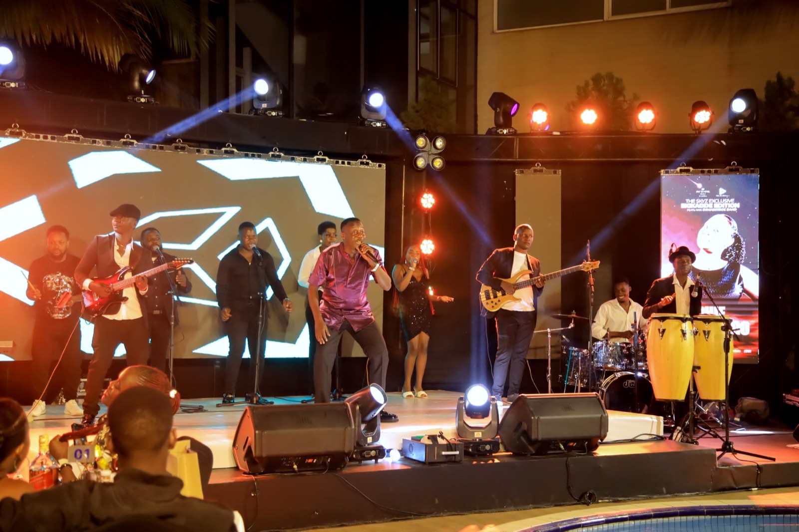 Sir Mesach Semakula and Sophie Nantongo on stage with D'Maestroz Band at The Skyz Exclusive Ekikadde Edition