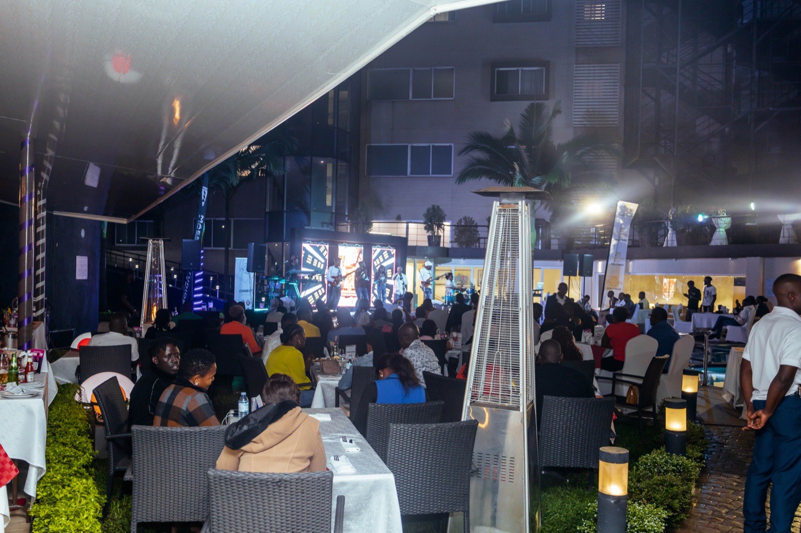 Guests watching Jose Chameleone perform at The Skyz Exclusive, Tropicanna Poolside