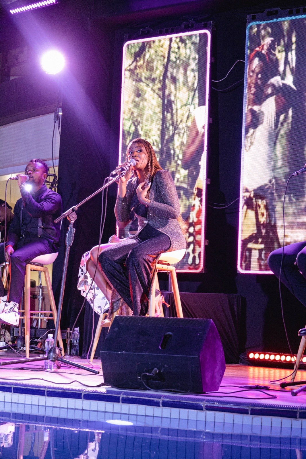 Naava Grey singing live poolside at The Skyz Exclusive