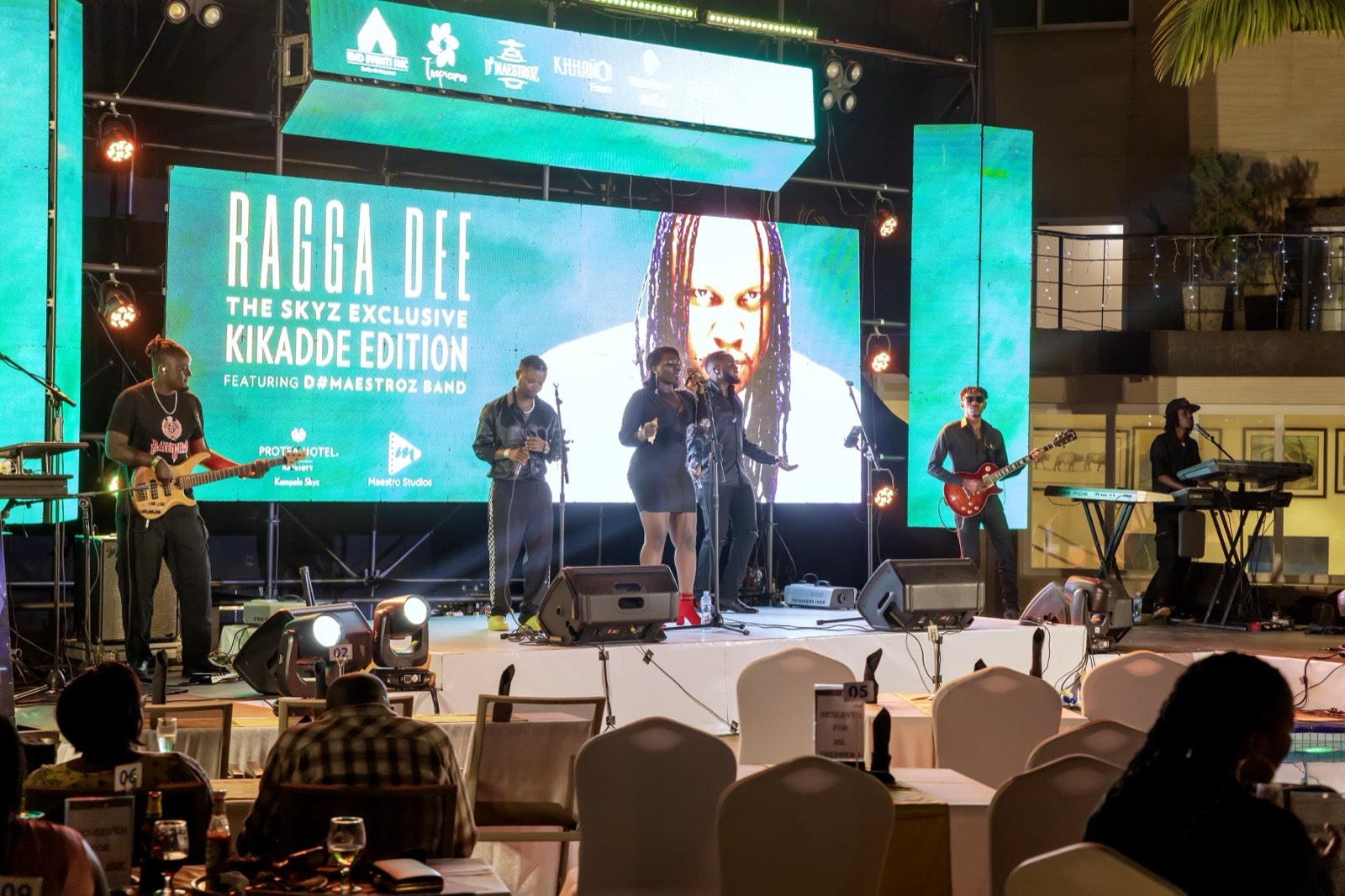 Ragga Dee performing with the full live band at The Skyz Exclusive Kikadde Edition