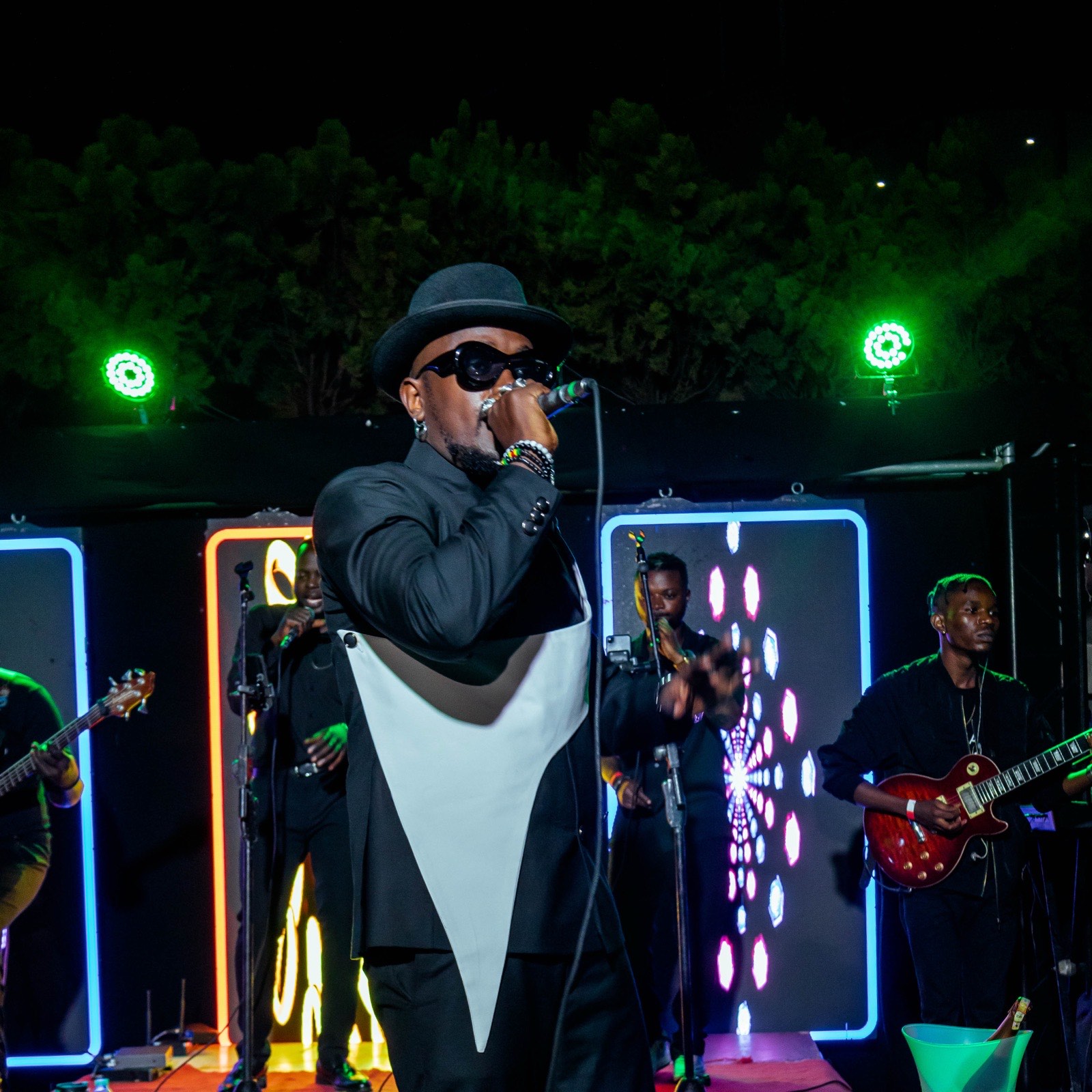 Ykee Benda performing live with his band at The Skyz Exclusive